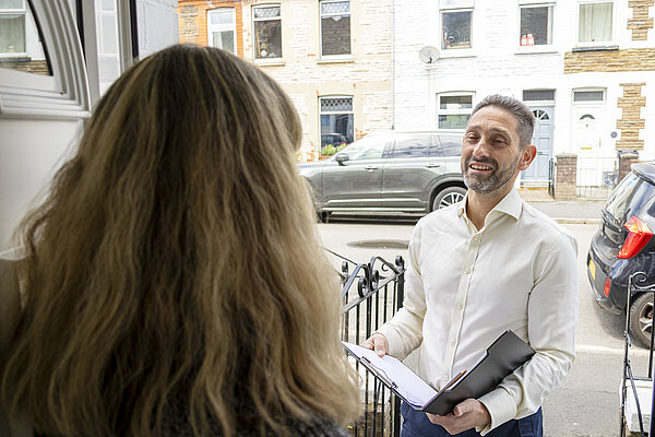 Rodney talking to a local resident